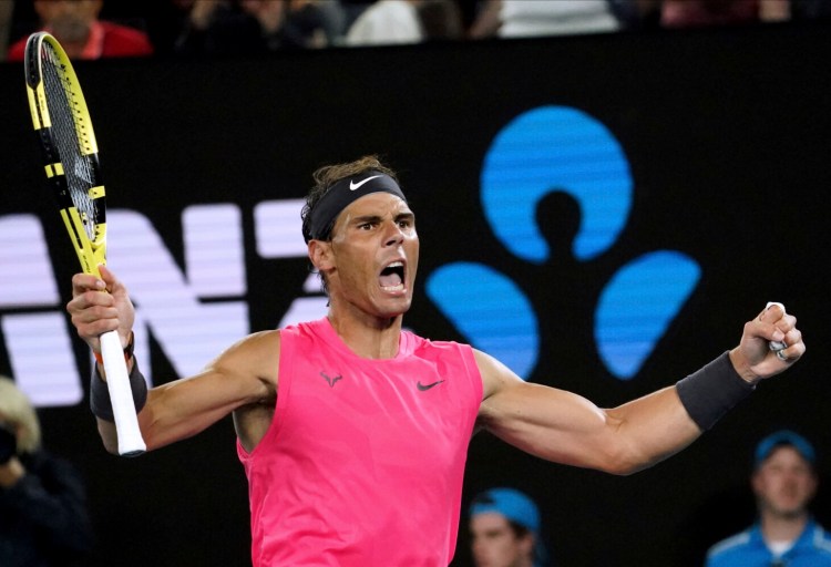 Rafael Nadal celebrates after defeating Nick Kyrgios, 6-3, 3-6, 7-6 (6), 7-6 (4) in their fourth round match on Monday in Melbourne, Australia.
