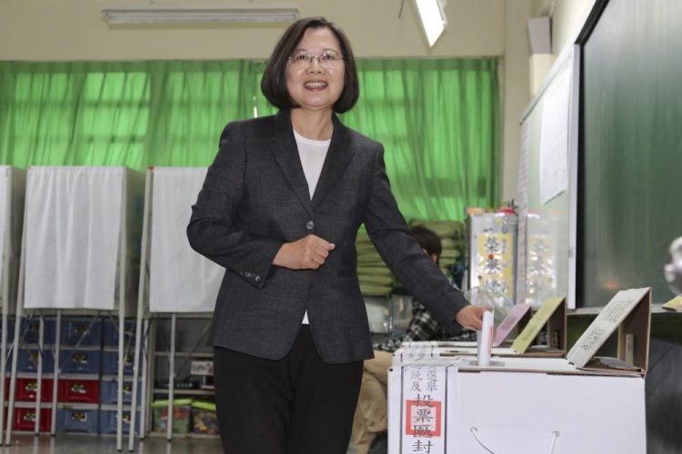 Taiwanese President and presidential election candidate Tsai Ing-wen casts her ballot at a polling station in New Taipei City, Taiwan, on Saturday. Tsai won a second term with a record 7.7 million votes. 