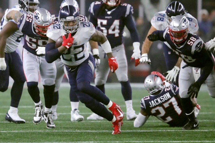 Tennessee running back Derrick Henry rushed for 182 yards and a touchdown as the Titans beat New England 20-13 in an AFC wild-card game, Saturday in Foxborough, Mass. 