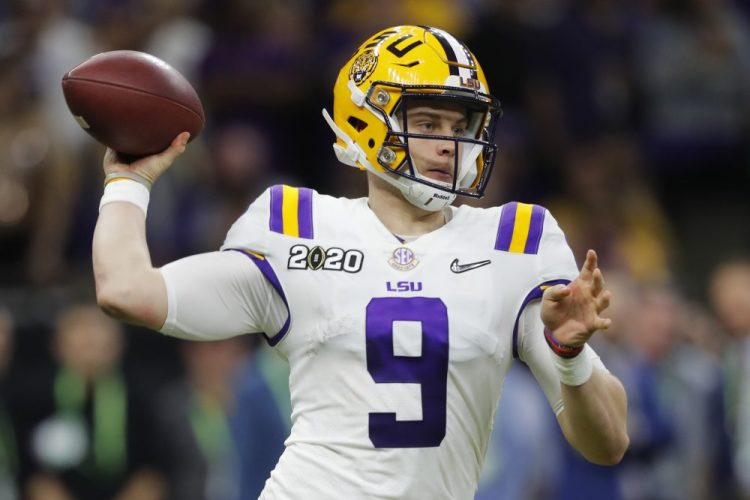 LSU quarterback Joe Burrow passes against Clemson in the second half of Monday night's national championship game in New Orleans. He led the Tigers to a 42-25 win over Clemson.
