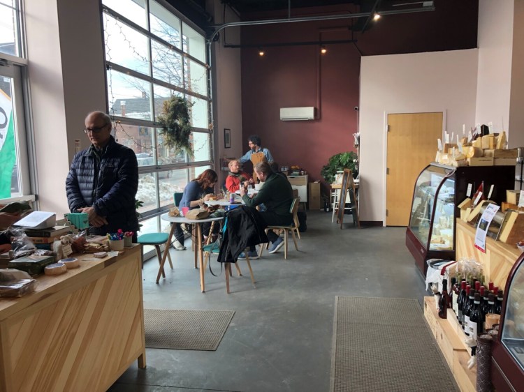 The newly expanded Cheese Shop of Portland offers a few tables for lunch. 