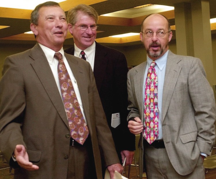 Augusta Mayor Bill Dowling, left, Maine Municipal Association Executive Director Chris Lockwood, center, and Augusta City Manager Bill Bridgeo respond to a comment from Maine Municipal Association President Bruce Benway in 2001 prior to the opening meeting of the agency's annual conference at the Augusta Civic Center.