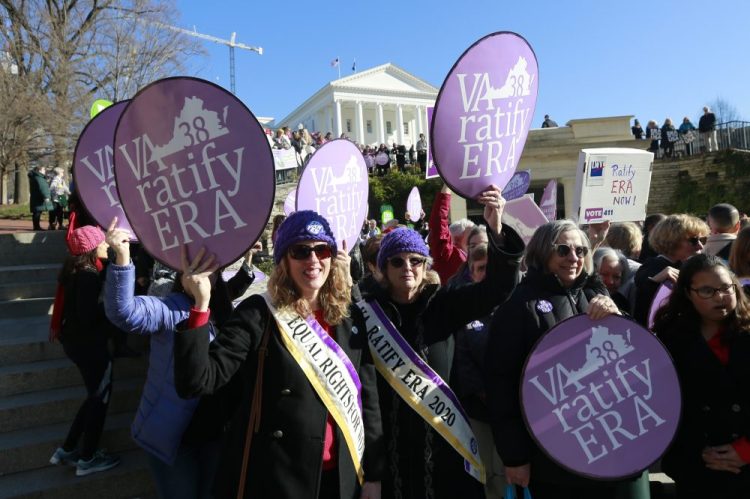 Equal Rights Amendment supporters demonstrate outside Virginia State Capitol in Richmond, Va. Wednesday, Jan. 8. 