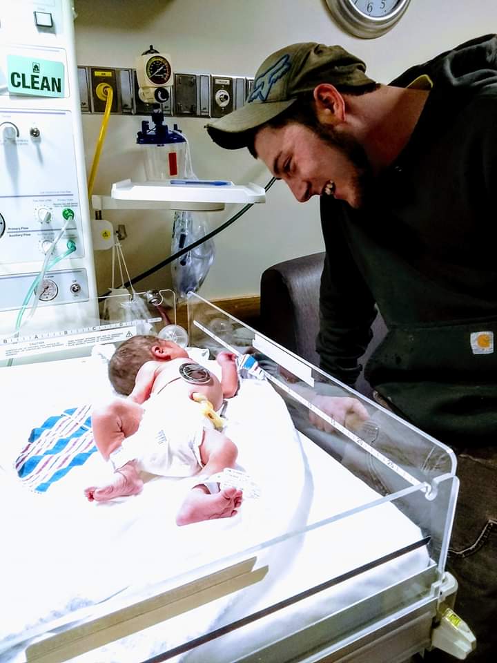 Father Cory Fortin beams over his daughter Camdyn Lynn Fortin, who was born at 2:05 a.m. Thursday, Jan. 2, after her mother, Shay-lynn Smith, of Cornville, went into Redington-Fairview General Hospital on Jan. 1.