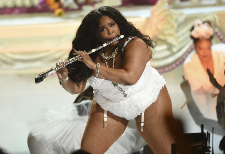 This June 23, 2019 file photo shows Lizzo playing the flute at the BET Awards in Los Angeles. 