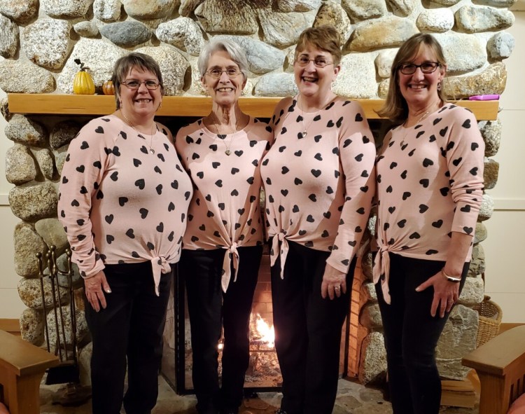Delivering Singing Valentines are quartet Heart & Soul, from left, Anne Danforth, Dotti Meyer, Sue Staples and Cathy Anderson. 