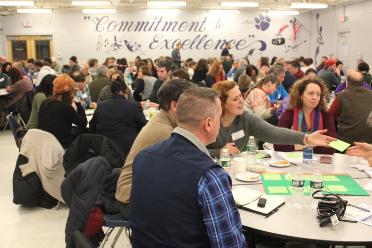 Community members discuss strengths, weaknesses and innovative ideas for educational opportunities in Waterville at the first public meeting of SPaRC in the Waterville Senior High School cafeteria Tuesday evening. SPaRC is a coalition of the area's schools, from daycare to adult education programs. 