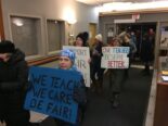 Chanting and carrying signs, Scarborough teachers stream into the municipal building during a school board meeting Thursday night to rally over stalled contract talks.