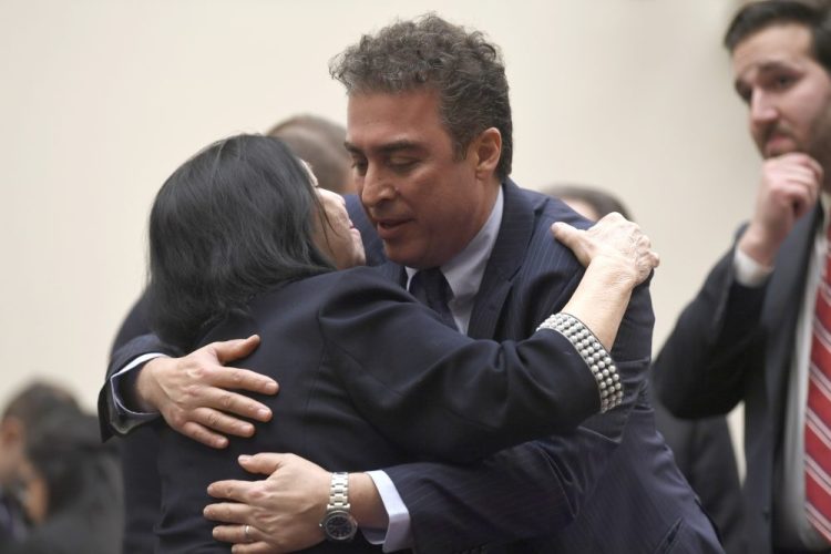 Christine Levinson, left, wife of Robert Levinson, a former FBI agent who vanished in Iran in 2007, gets a hug from Babak Namazi, the son of Baquer Namazi, who has been held in Iran, following their testimony before a House Foreign Affairs Subcommittee on Capitol Hill in Washington in March 2019. The killing of a top Iranian general has ratcheted up the anxiety of families of Americans held in Iran.  