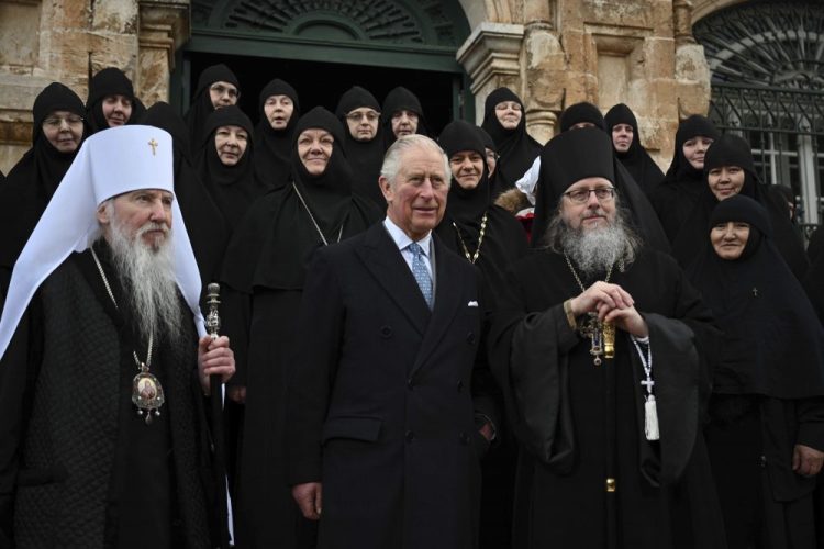 Britain's Prince Charles, center, at the Church of St Mary Magdalene where Charles' grandmother Princess Alice is buried at the Mount of Olives in Jerusalem, Israel, Friday.