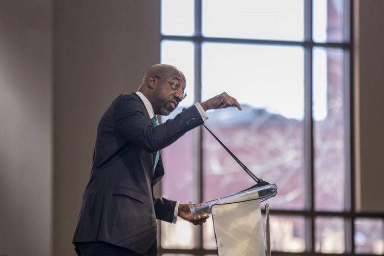 The Rev. Raphael G. Warnock speaks during the Martin Luther King, Jr. annual commemorative service at Ebenezer Baptist Church in Atlanta on Monday. 
