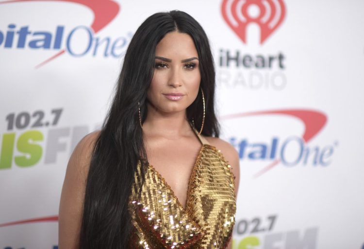 In this Dec. 1, 2017 file photo, Demi Lovato arrives at Jingle Ball at The Forum in Inglewood, Calif. 