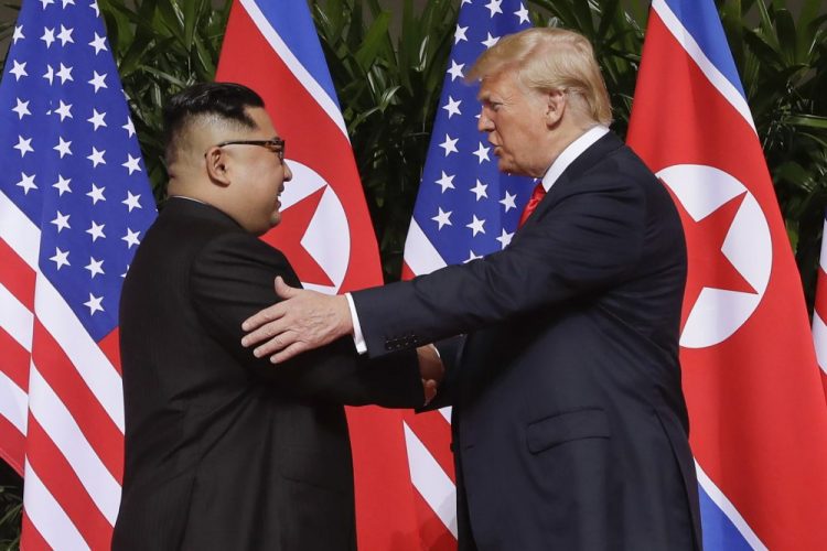 President Trump shakes hands with North Korea leader Kim Jong Un at the Capella resort on Sentosa Island in Singapore on June 12, 2018. Kim opened the new year expressing deep frustrations over the stalled negotiations. 