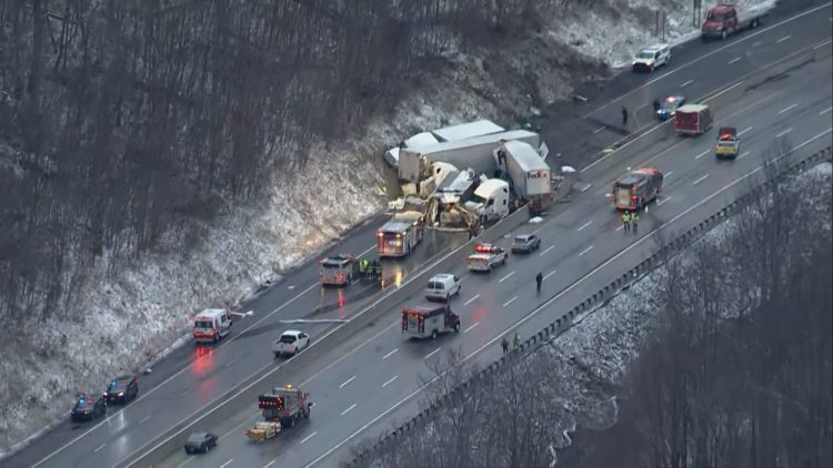 This image from video provided by KDKA TV shows the scene near Greensburg, Pa. along the Pennsylvania Turnpike where multiple people were killed and dozens were injured in a crash early Sunday.