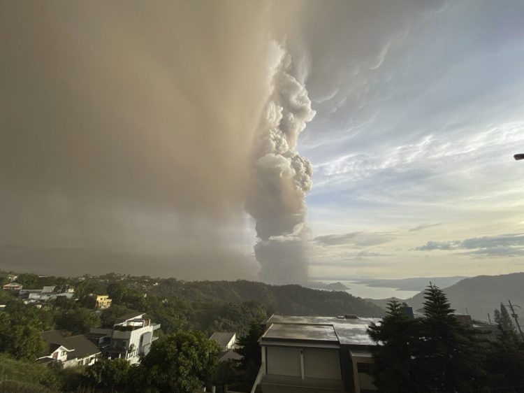 Plumes of smoke and ash rise from the Taal volcano on Sunday in Tagaytay, Manila, Philippines. Taal consists of multiple stratovolcanoes. Its primary feature is the three-mile-wide Volcano Island, which has 47 craters and sits in a lake.