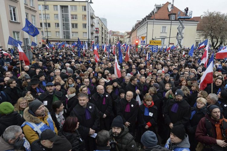 Judges and lawyers from across Europe, many of them dressed in their judicial robes, march silently in Warsaw, Poland, on Saturday. The rally was a show of solidarity with Polish judges, who are protesting a bill that would allow the government to fire judges whose rulings they don't like.