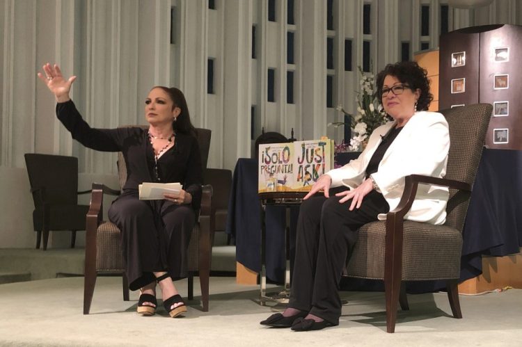 Singer Gloria Estefan moderates a presentation with Supreme Court Justice Sonia Sotomayor in Miami. 