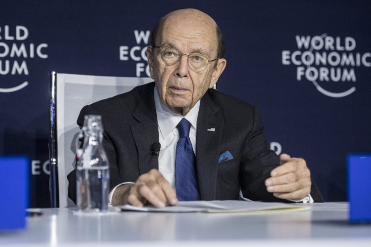 Commerce Secretary Wilbur Ross speaks at a press conference Wednesday during the World Economic Forum in Davos, Switzerland. Ross suggested Thursday that a viral outbreak in China could offer an upside to the U.S. economy by encouraging manufacturers to move back to the U.S. 