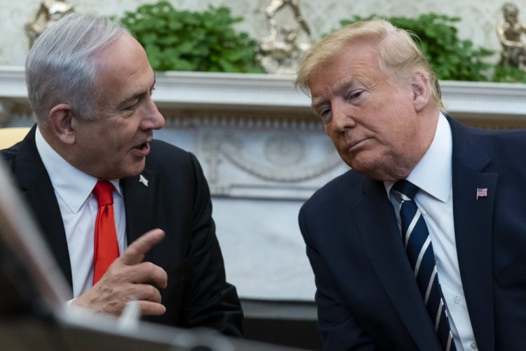 President Trump listens to Israeli Prime Minister Benjamin Netanyahu during a meeting in the Oval Office on Monday in Washington.
