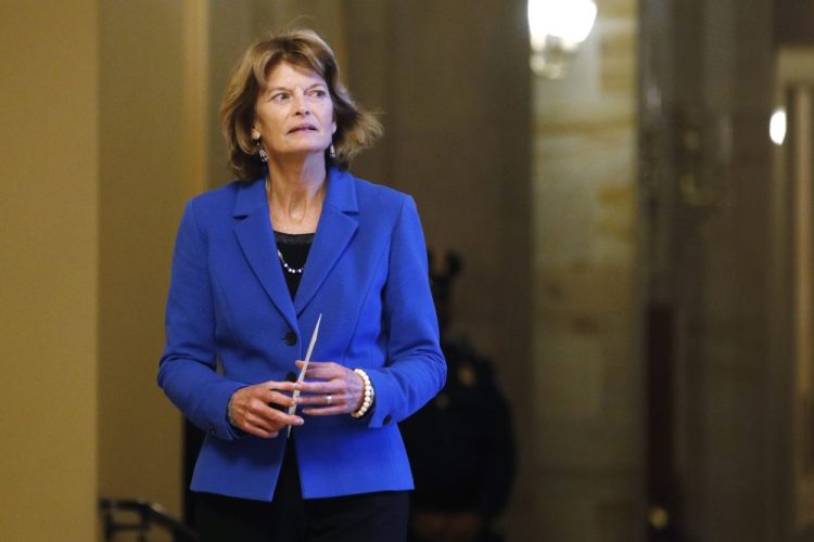 Sen. Lisa Murkowski, R-Alaska, returns to the Senate chamber after a meeting in the majority leader's office during a break in the impeachment trial of President Trump at the U.S. Capitol on Friday. Murkowski voted not to call witnesses or obtain documents for the Senate trial.