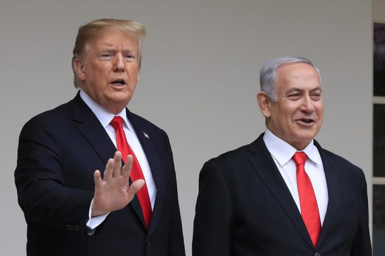 In this March 25, 2019, file photo, President Donald Trump welcomes visiting Israeli Prime Minister Benjamin Netanyahu to the White House in Washington. 