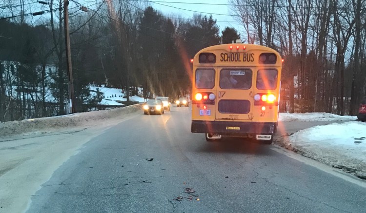 A school bus carrying students from Bonny Eagle middle and high schools collided with a tractor-trailer hauling wood chips in Limington on Monday morning. No injuries were reported.