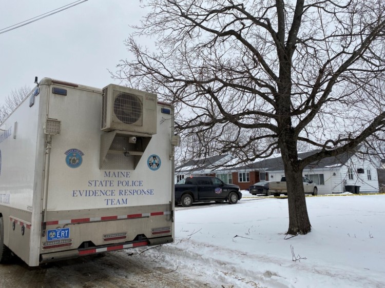 Newport and Maine State Police officers investigate the premises at 16 North St. in Newport on Jan.10 after receiving a 911 call. Frederick Allen has been charged with murder in the death of his wife, Anielka Allen.