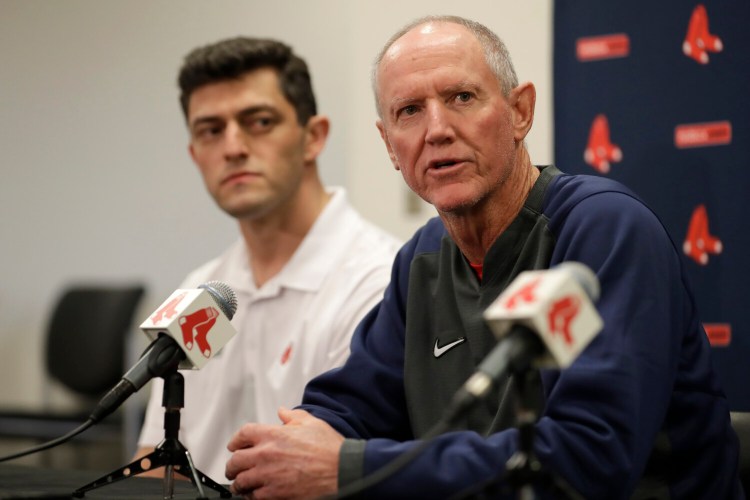 Ron Roenicke, right, speaks as Red Sox Chief Baseball Officer Chaim Bloom looks on after Roenicke was named the interim manager of the Boston Red Sox on Tuesday in Fort Myers, Florida.
