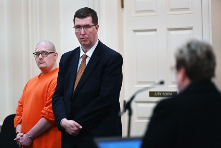 Dustan Bentley, left, who was charged with murder in the death of his roommate last year, listens to Assistant Attorney General Meg Elam during Bentley's plea hearing in York County Superior Court on Tuesday. In the center is Bentley's attorney, Joseph Mekonis.
