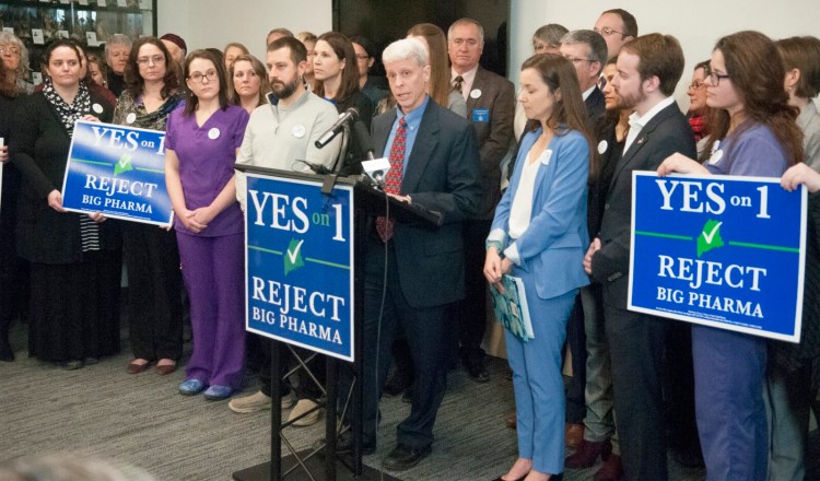 Dr. Zach Mazone, speaks during a Yes on 1 news conference on Tuesday at the Maine State House in Augusta. 