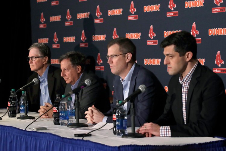 It has been quite an offseason for Boston Red Sox management, from left, owner John Henry, chairman Tom Werner, CEO Sam Kennedy and Chief Baseball Officer Chaim Bloom. The team parted ways with Alex Cora, is being investigated for sign stealing and is trying to workout a deal with the Dodgers to trade former MVP Mookie Betts, though that appears to be on the ropes. 