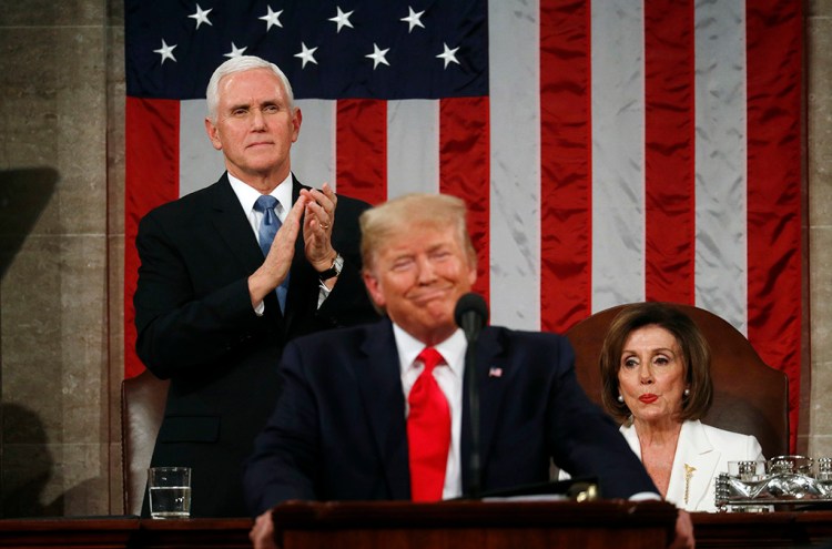 President Trump delivers his State of the Union address Tuesday night to a joint session of Congress as Vice President Mike Pence and House Speaker Nancy Pelosi look on.