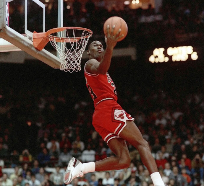 Michael Jordan throws one down during the 1988 slam-dunk competition of the NBA All-Star weekend in Chicago.  Jordan left the old Chicago Stadium that night with the trophy. To this day, many believe Wilkins was the rightful winner.