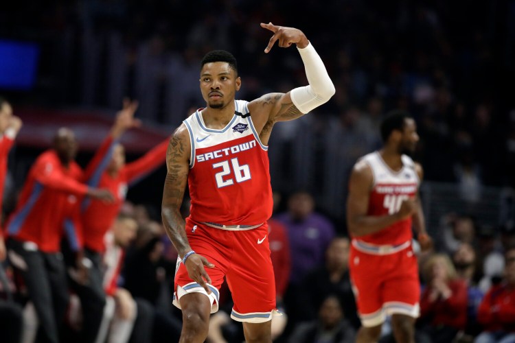 Sacramento's Kent Bazemore reacts after scoring against the Los Angeles Clippers on Sunday in Los Angeles. Bazemore scored 23 points in the Kings' 112-103 win.