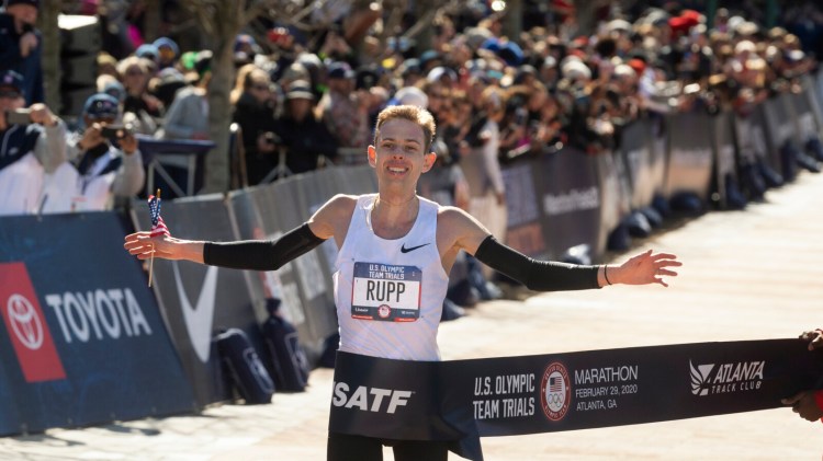 Galen Rupp crosses the finish line to win the U.S. Olympic men's marathon trials on Saturday in Atlanta. 
