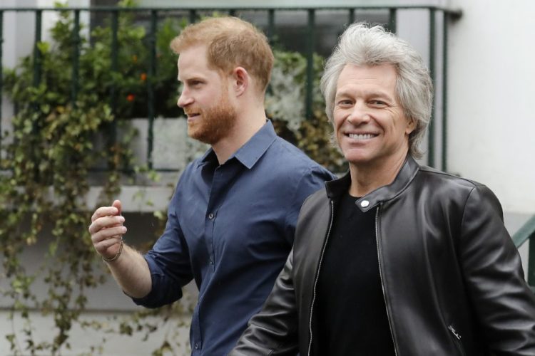 Prince Harry and Jon Bon Jovi leave Abbey Road Studios in London on Friday.
