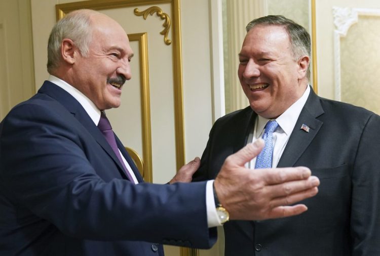 Belarusian President Alexander Lukashenko greets U.S. Secretary of State Mike Pompeo on Saturday. At a news conference, the secretary of state said U.S. energy producers “stand ready to deliver 100 percent of the oil you need at competitive prices."