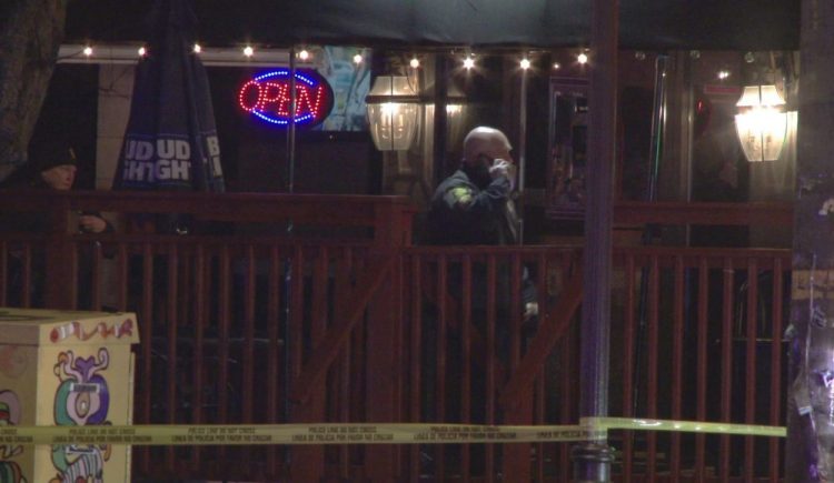 In this image taken from video, police investigate the scene of a shooting Sunday at the Majestic Lounge, in Hartford, Conn. Multiple people were shot at the Connecticut nightclub, police said early Sunday.
