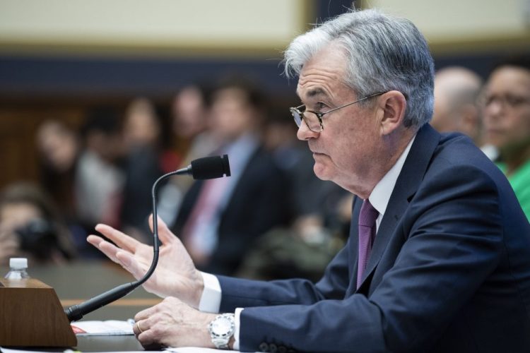 Federal Reserve Chairman Jerome Powell testifies before the House Committee on Financial Services on Tuesday in Washington. Along with interest rates, Powell also addressed the coronavirus, saying it'll likely effect the U.S. economy but didn't say how much.