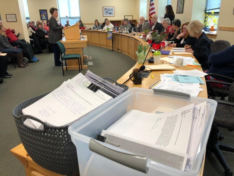 Two tubs containing written testimony from more than 350 people were delivered Wednesday to the Legislature’s Health and Human Services Committee in support of a bill to increase the reimbursement rate for “direct care” workers who provide services to elderly and disabled Mainers.