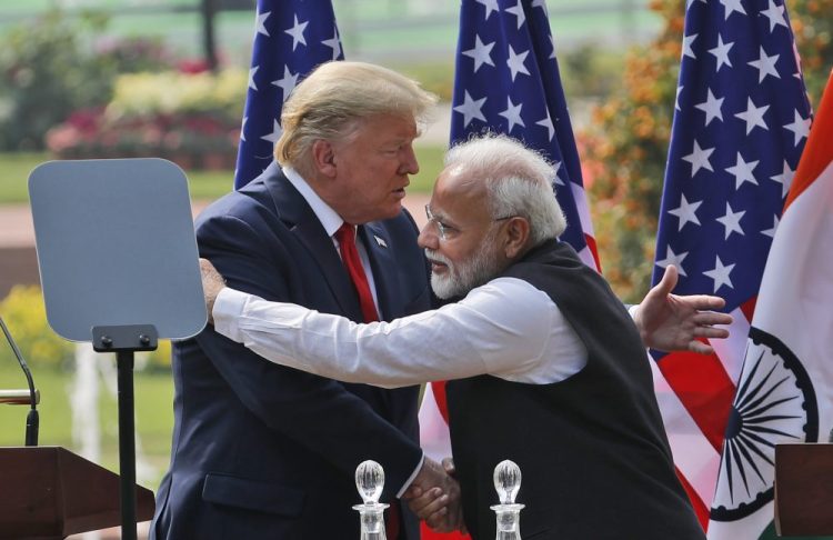 President Trump and Indian Prime Minister Narendra Modi give a joint statement Tuesday in New Delhi, India. Trump said he had raised the issue of religious freedom with Modi and that the prime minister was “incredible” on the subject.