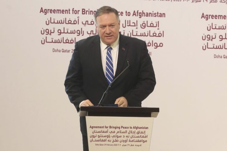 Secretary of State Mike Pompeo speaks during the peace agreement signing between Taliban and U.S. officials in Doha, Qatar, on Saturday.

