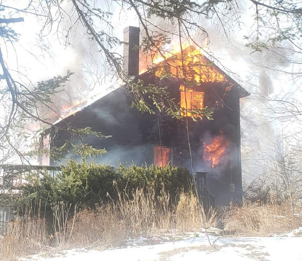 The fire was spotted by people passing by the house at 6 Heron Cove, off Waterman's Beach Road near the intersection with Route 73 in South Thomaston.