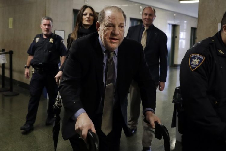 Harvey Weinstein arrives at court in his rape trial, in New York, Friday, Feb. 7.