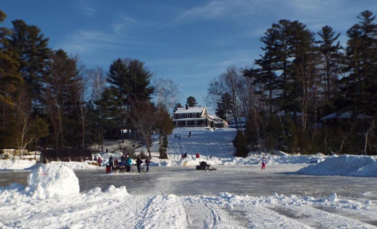 Children of all ages enjoy the s'mores stations, skating, sledding, biking and snowshoeing February 2019 at the Snow Pond Center for the Arts campus in Sidney.  
