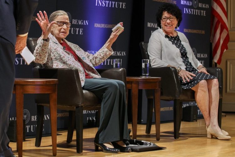 Supreme Court Justices Ruth Bader Ginsburg and Sonia Sotomayor arrive at a panel celebrating Sandra Day O'Connor, the first woman to be a Supreme Court Justice, at the Library of Congress in Washington on Sept. 25, 2019. During his visit to India, President Trump said the two justices should recuse themselves from his two upcoming cases.