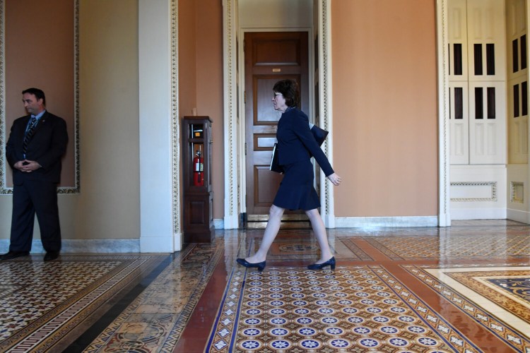 Sen. Susan Collins, R-Maine, leaves a meeting with fellow Republicans Jan. 15 at the United States Capitol.