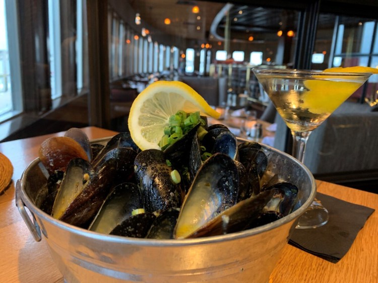 Sauteed mussels and a Lilly Martini are included in the pairing at DiMillos on the Water in Portland. 