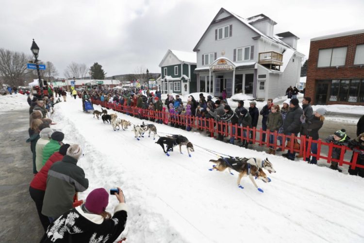 Musher Denis Tremblay, of Saint Michel des Saints, Quebec, Canada, leads his team at the start of the Can-Am Crown in the 2018 race. He won the race in March 2020. The race has been cancelled for this season.