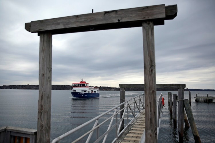The passenger ferry Independence arrives at the dock on Chebeague Island.